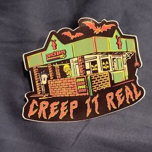 Dutch Bros Spooky Sticker with Green and Orange